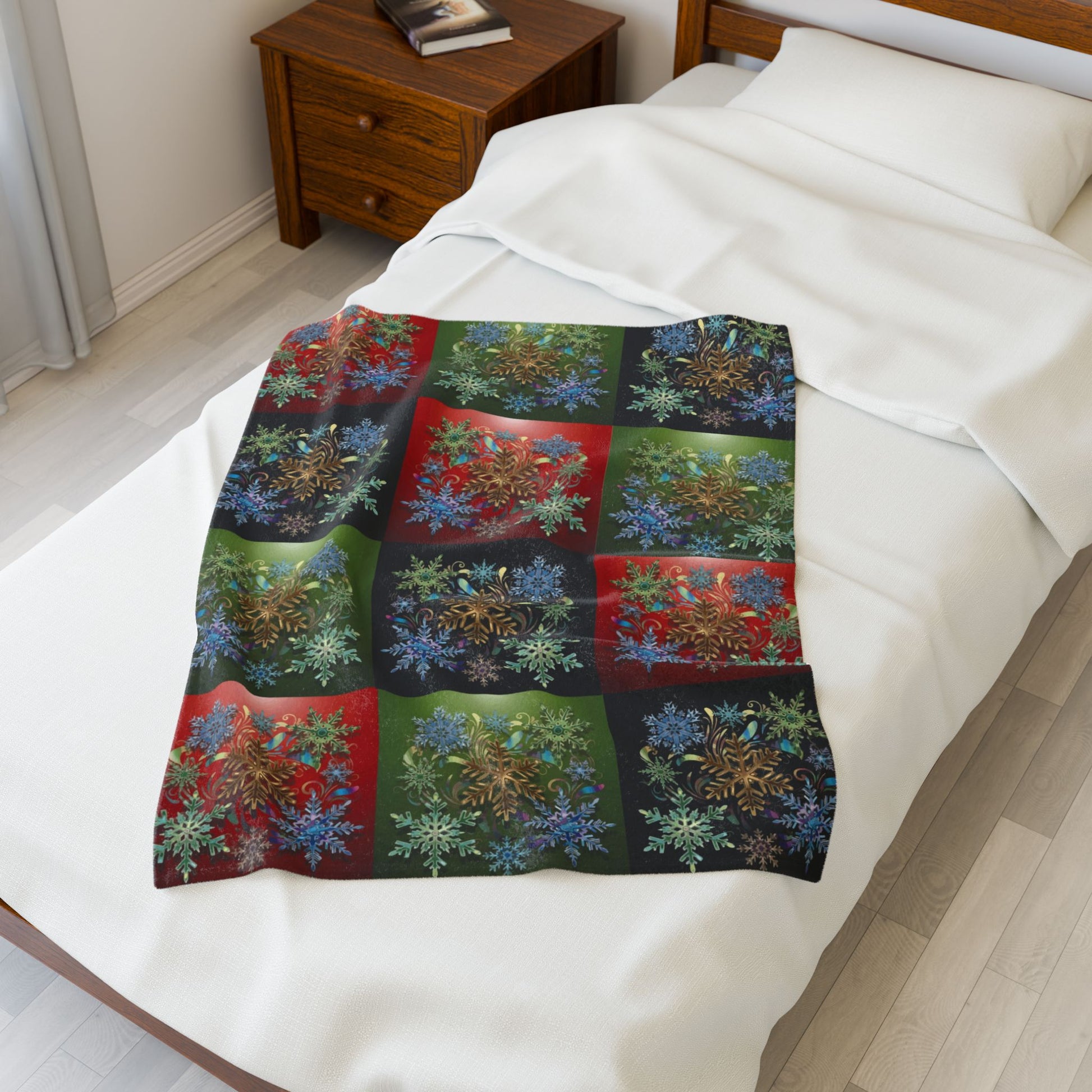Colorful quilt with floral pattern draped over a bed in a bedroom setting.