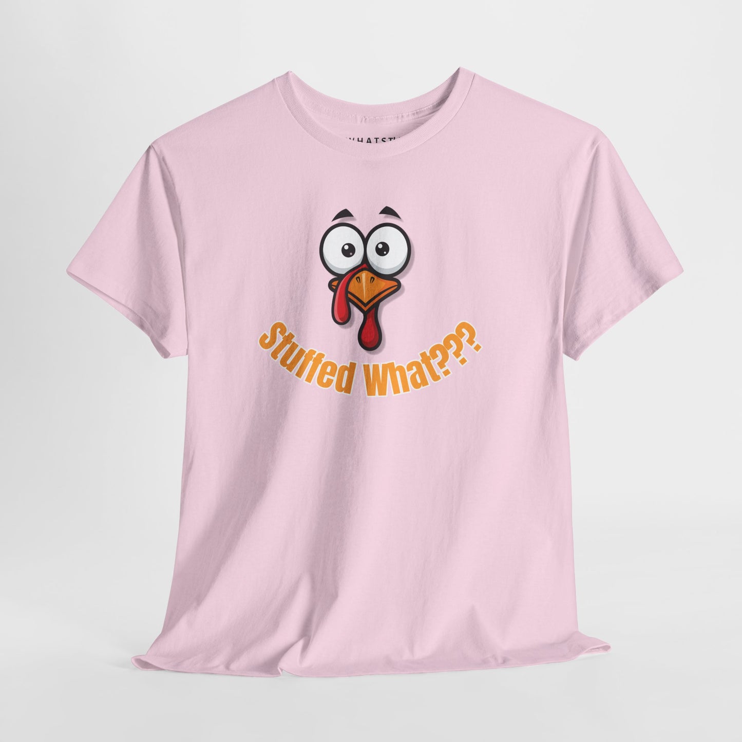 Pink t-shirt with a cartoon turkey face and 'Stuffed What???' text on a white background