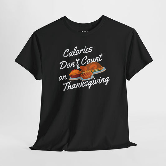 Black t-shirt with Thanksgiving-themed text and graphics on a light gray background