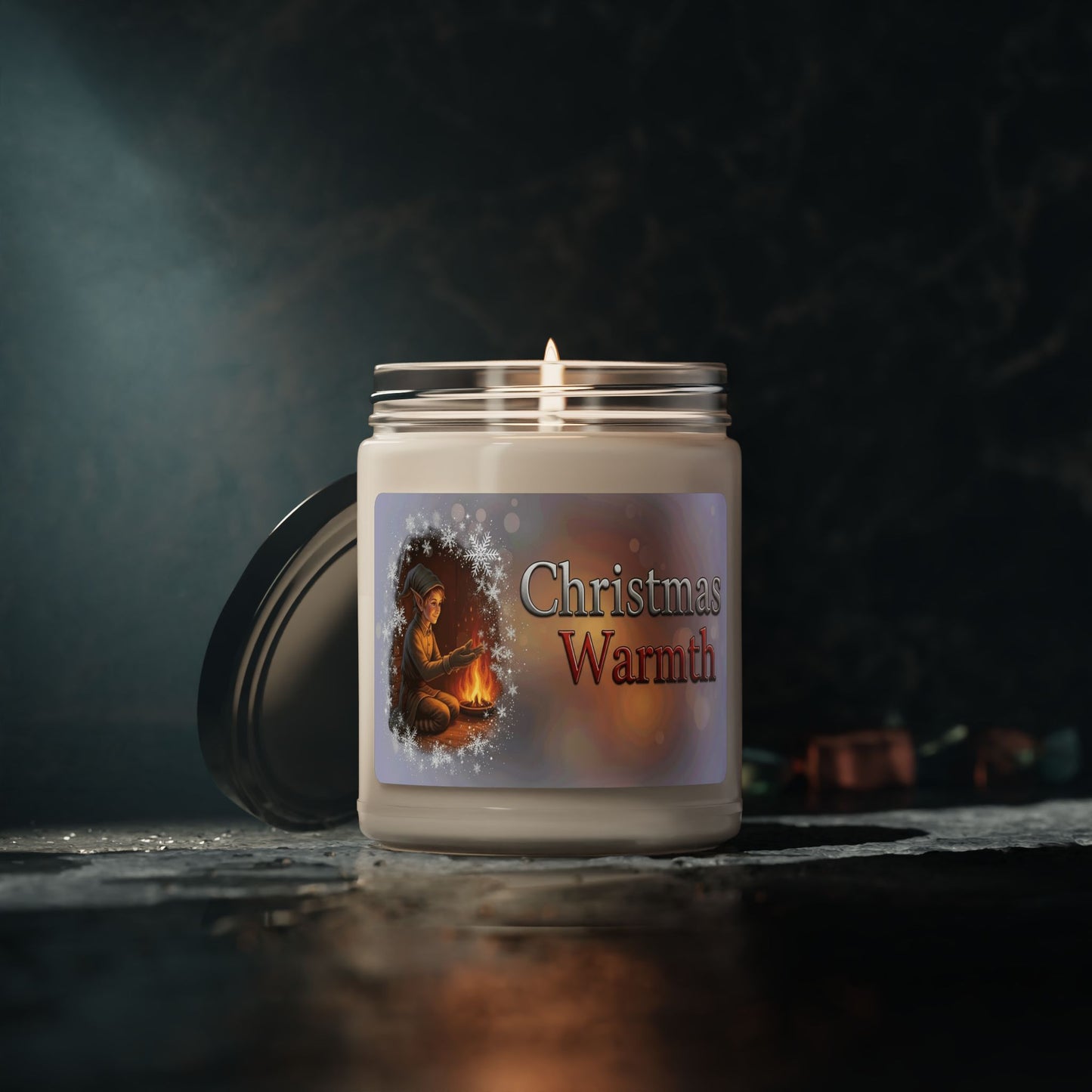 Candle with 'Christmas Warmth' label on a dark background
